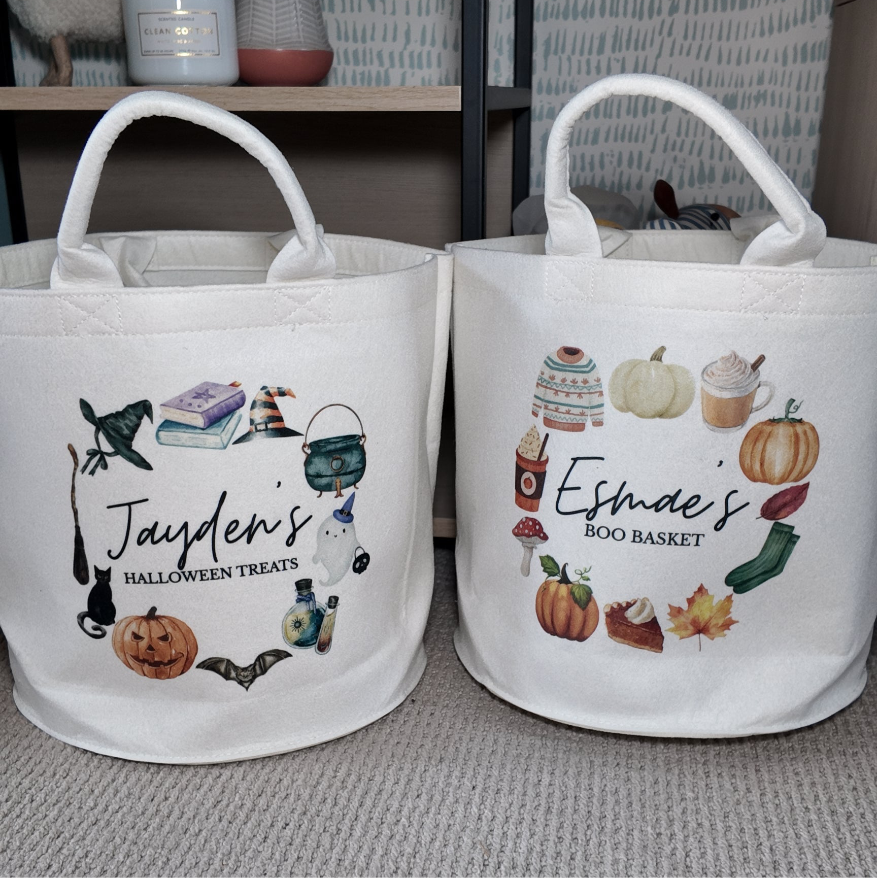 Two white bags with Halloween-themed designs and text on a neutral background.